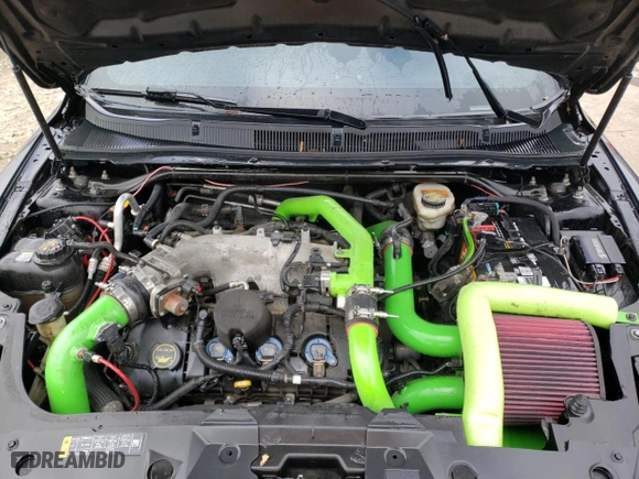 2015 Ford Taurus SHO with VIN 1FAHP2KT4FG100397, listed as a Copart auction lot 82772204 with 105621 miles and Salvage Title. Bid and sale history available at carsss.com. Image 11.