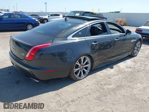 2015 Jaguar XJ R-Sport with VIN SAJWJ1CD6F8V83990, listed as a IAAI auction lot 41936162 with Not Provided miles and . Bid and sale history available at DreamBid. Image 4.