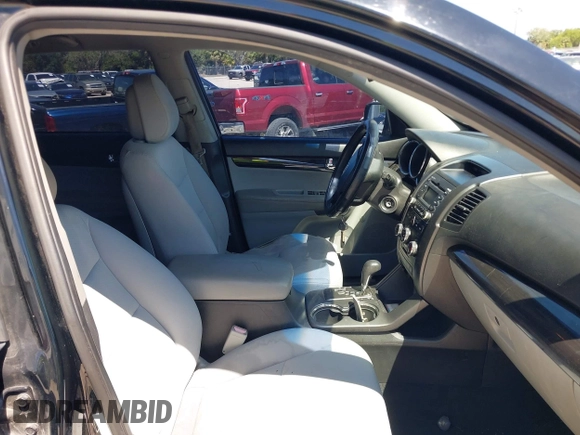 2013 Kia Sorento LX with VIN 5XYKT4A25DG383277, listed as a IAAI auction lot 42038106 with 108,166 mi miles. Bid and sale history available at carsss.com. Image 5.