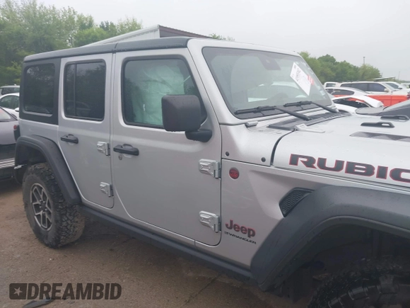 2024 Jeep Wrangler Rubicon with VIN 1C4PJXFG7RW252959, listed as a IAAI auction lot 41955302 with 27,727 mi miles and . Bid and sale history available at DreamBid. Image 13.