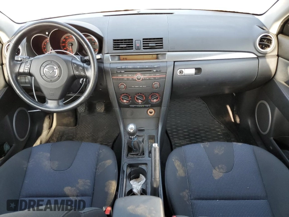 2006 Mazda 3 S Grand Touring with VIN JM1BK343861434940, listed as a Copart auction lot 63624024 with 56,737 mi miles and Salvage Title. Bid and sale history available at DreamBid. Image 8.