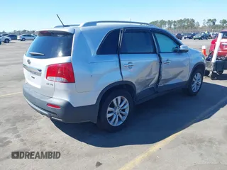 2011 Kia Sorento EX with VIN 5XYKU4A23BG164098, listed as a IAAI auction lot 41694340 with 136,361 mi miles. Bid and sale history available at carsss.com. Image 4.