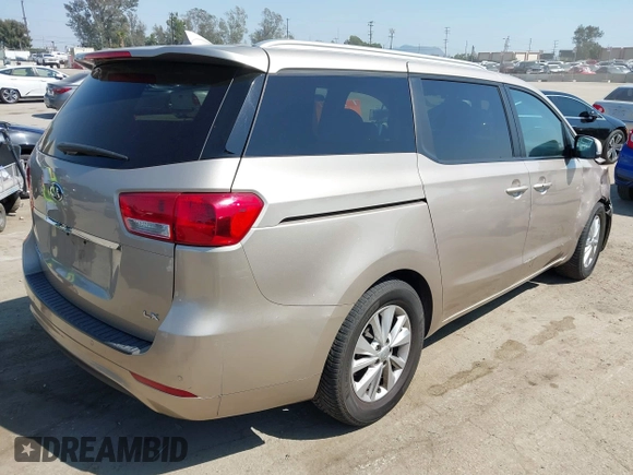 2017 Kia Sedona LX with VIN KNDMB5C16H6254544, listed as a IAAI auction lot 41961809 with 124,658 mi miles. Bid and sale history available at carsss.com. Image 4.