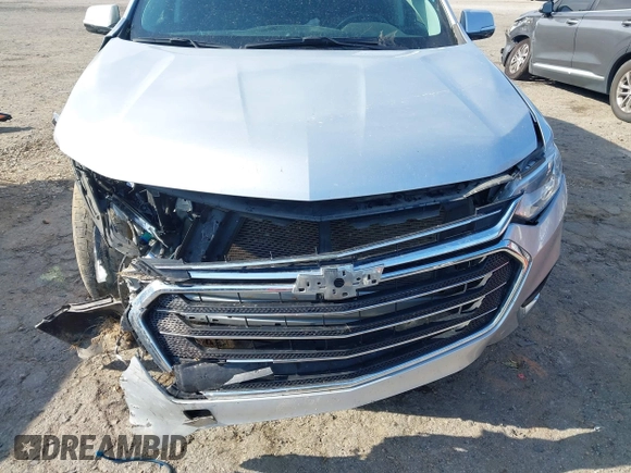 2020 Chevrolet Traverse LT Cloth z VIN 1GNERGKW3LJ319386, wystawiony jako IAAI lot #42308032 z przebiegiem 77 108 mil mil oraz . Historia ofert i sprzedaży dostępna na DreamBid. Obrazek 6.