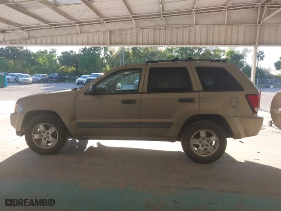 2005 Jeep Grand Cherokee Laredo with VIN 1J8HR48N95C713185, listed as a IAAI auction lot 41777242 with 95,262 mi miles. Bid and sale history available at carsss.com. Image 14.