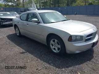 2010 Dodge Charger SXT with VIN 2B3CA3CV8AH277058, listed as a IAAI auction lot 42179056 with 162,971 mi miles. Bid and sale history available at carsss.com. Image 1.