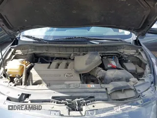 2015 Mazda CX-9 Touring with VIN JM3TB2CA7F0460232, listed as a IAAI auction lot 42344122 with 103,478 mi miles and . Bid and sale history available at DreamBid. Image 10.
