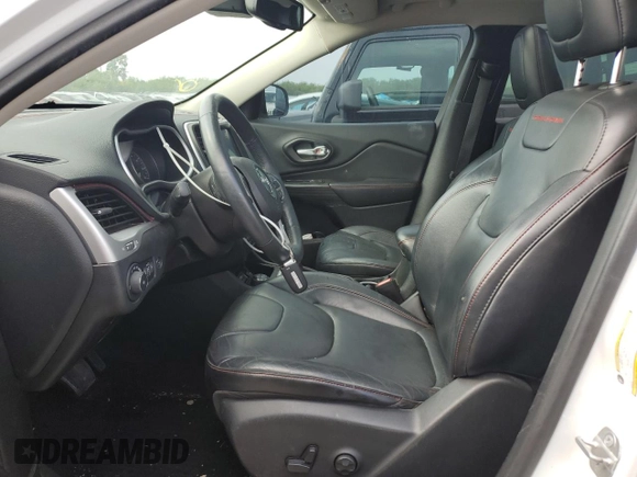 2014 Jeep Cherokee Trailhawk with VIN 1C4PJMBS9EW140344, listed as a Copart auction lot 50579005 with 117,326 mi miles and Salvage Title. Bid and sale history available at carsss.com. Image 7.
