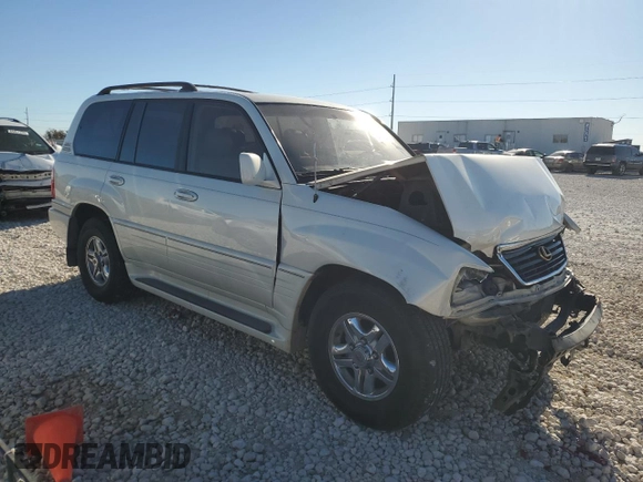 2000 Lexus LX 470 z VIN JT6HT00W7Y0114787, wystawiony jako Copart lot #84433924 z przebiegiem Nie podano mil oraz Szkoda całkowita • Salvage title. Historia ofert i sprzedaży dostępna na DreamBid. Obrazek 4.