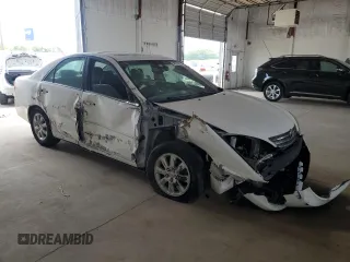 2002 Toyota Camry LE z VIN 4T1BE32K82U108626, wystawiony jako Copart lot #59215024 z przebiegiem Nie podano mil oraz Szkoda całkowita • Salvage title. Historia ofert i sprzedaży dostępna na DreamBid. Obrazek 4.