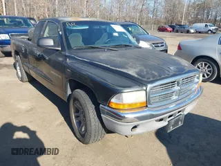 2001 Dodge Dakota with VIN 1B7GL22X11S307842, listed as a IAAI auction lot 41484381 with 154,012 mi miles. Bid and sale history available at carsss.com. Image 1.