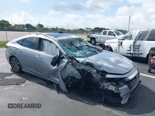 2019 Honda Insight Touring with VIN 19XZE4F96KE009818, listed as a IAAI auction lot 42735784 with 62,117 mi miles and . Bid and sale history available at DreamBid. Image 1.