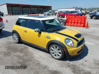 2008 MINI Hardtop S with VIN WMWMF735X8TV38437, listed as a IAAI auction lot 42072390 with 139,059 mi miles and . Bid and sale history available at DreamBid. Image 1.