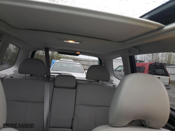 2010 Subaru Forester 2.5X Limited with VIN JF2SH6DC1AH751637, listed as a Copart auction lot 52436445 with 127,352 mi miles and Salvage Title. Bid and sale history available at carsss.com. Image 10.