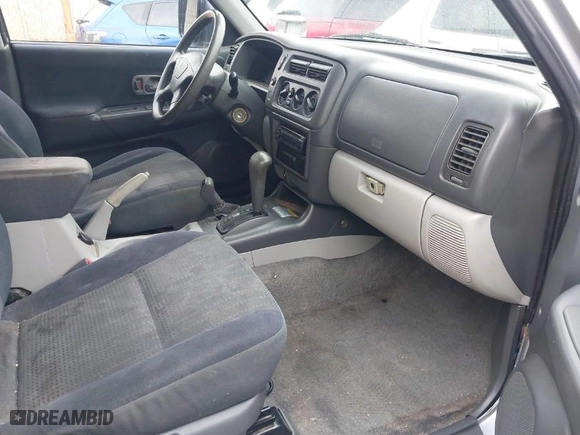 2004 Mitsubishi Montero Sport LS with VIN JA4MT21R24J003641, listed as a IAAI auction lot 41809144 with 223,449 mi miles. Bid and sale history available at carsss.com. Image 5.