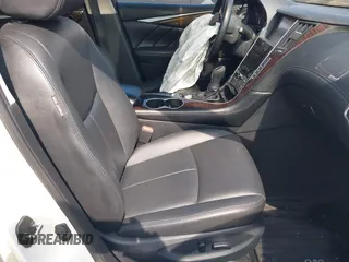 2019 Infiniti Q50 Luxe with VIN JN1EV7ARXKM557946, listed as a IAAI auction lot 40362058 with 56,615 mi miles and . Bid and sale history available at carsss.com. Image 5.