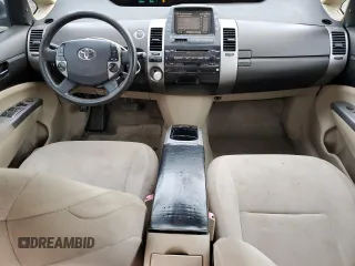 2005 Toyota Prius z VIN JTDKB20U653052272, wystawiony jako Copart lot #52339475 z przebiegiem 299 999 mil mil oraz Nie do naprawy • Non repairable. Historia ofert i sprzedaży dostępna na DreamBid. Obrazek 8.