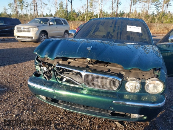 2007 Jaguar XJ VDP with VIN SAJWA82C37TH14330, listed as a IAAI auction lot 41316658 with 59,745 mi miles. Bid and sale history available at carsss.com. Image 6.