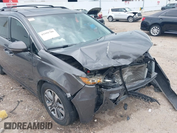 2015 Honda Odyssey Touring Elite with VIN 5FNRL5H99FB089642, listed as a IAAI auction lot 42591786 with 100,755 mi miles and . Bid and sale history available at DreamBid. Image 18.