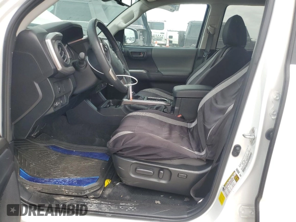 2023 Toyota Tacoma SR5 z VIN 3TMAZ5CN2PM209813, wystawiony jako Copart lot #53946645 z przebiegiem 23 411 mil mil oraz Szkody całkowita. Historia ofert i sprzedaży dostępna na DreamBid. Obrazek 7.