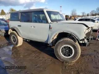 2023 Ford Bronco with VIN 1FMEE5DP8PLB93420, listed as a Copart auction lot 42247495 with 8,802 mi miles and Salvage Title. Bid and sale history available at DreamBid. Image 4.