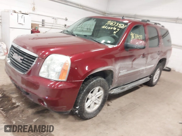 2011 GMC Yukon SLT with VIN 1GKS2CE08BR308792, listed as a IAAI auction lot 41633427 with 216,483 mi miles. Bid and sale history available at carsss.com. Image 17.