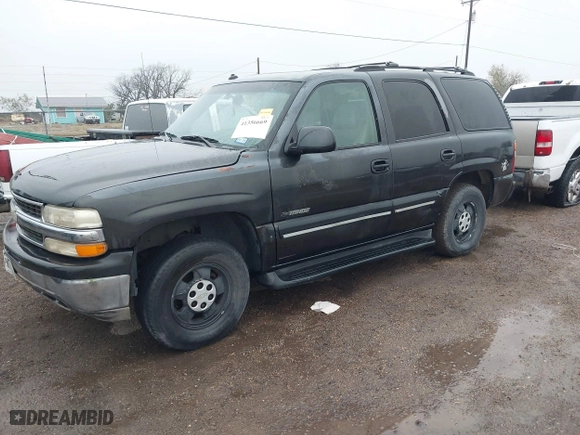 2003 Chevrolet Tahoe LT with VIN 1GNEC13Z33R166971, listed as a IAAI auction lot 41356669 with 318,527 mi miles. Bid and sale history available at carsss.com. Image 2.