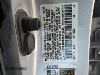 2007 Honda Civic EX with VIN 1HGFA16887L018444, listed as a Copart auction lot 42283955 with 247,409 mi miles and Salvage Title. Bid and sale history available at DreamBid. Image 12.