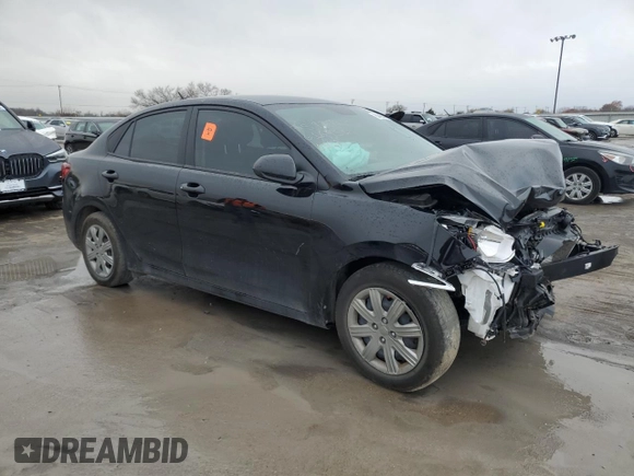 2023 Kia Rio LX with VIN 3KPA24AD7PE616450, listed as a Copart auction lot 84690444 with 28,908 mi miles and Salvage Title. Bid and sale history available at DreamBid. Image 4.
