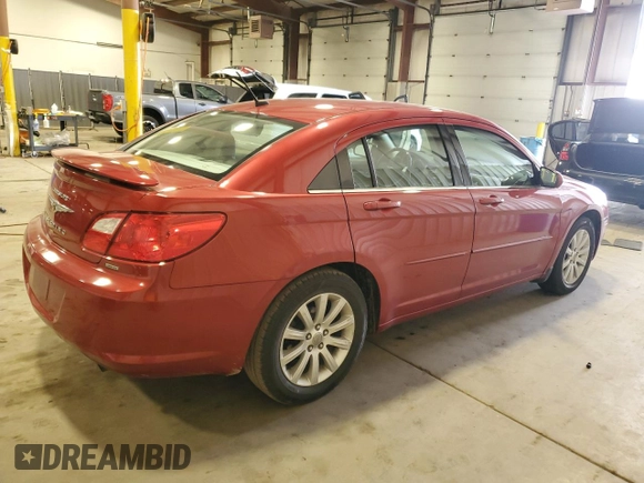 2010 Chrysler Sebring Limited with VIN 1C3CC5FB5AN146719, listed as a Copart auction lot 82712994 with 52,774 mi miles and Salvage Title. Bid and sale history available at carsss.com. Image 3.