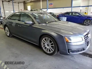 2015 Audi A8 with VIN WAUJGAFD3FN016587, listed as a Copart auction lot 60778904 with 116,818 mi miles and Clean title. Bid and sale history available at DreamBid. Image 4.