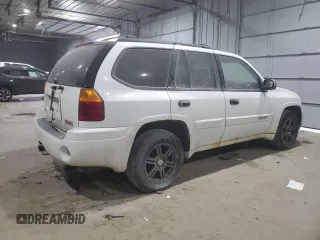 2003 GMC Envoy SLE z VIN 1GKDT13S632156357, wystawiony jako Copart lot #41398035 z przebiegiem 160 338 mil mil oraz Szkoda całkowita • Salvage title. Historia ofert i sprzedaży dostępna na DreamBid. Obrazek 3.