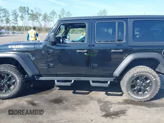2021 Jeep Wrangler Unlimited Sport S with VIN 1C4HJXDN6MW812565, listed as a IAAI auction lot 41506140 with 27,273 mi miles and . Bid and sale history available at DreamBid. Image 14.