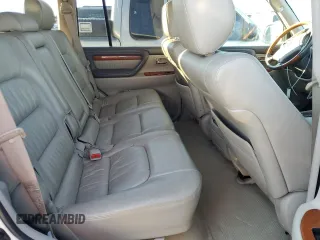 2004 Lexus LX 470 z VIN JTJHT00WX43539807, wystawiony jako Copart lot #87842755 z przebiegiem 335 478 mil mil oraz Czysty tytuł • Clean title. Historia ofert i sprzedaży dostępna na DreamBid. Obrazek 11.