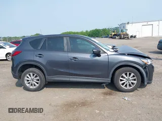 2016 Mazda CX-5 Sport with VIN JM3KE4BY7G0893984, listed as a IAAI auction lot 42479813 with Not provided miles and . Bid and sale history available at DreamBid. Image 14.