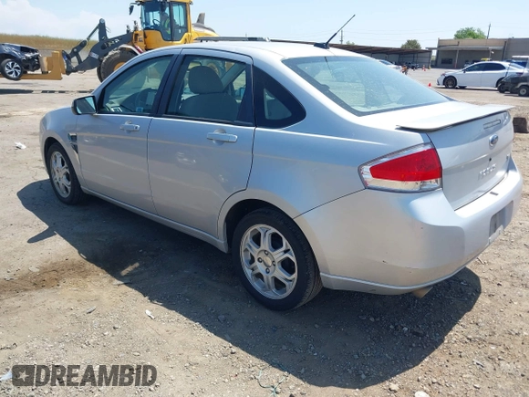 2008 Ford Focus SE with VIN 1FAHP35N28W300528, listed as a IAAI auction lot 42149643 with 138,115 mi miles. Bid and sale history available at carsss.com. Image 3.