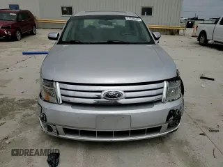 2009 Ford Taurus Limited z VIN 1FAHP25W99G111440, wystawiony jako Copart lot #51630465 z przebiegiem 107 418 mil mil oraz Szkoda całkowita • Salvage title. Historia ofert i sprzedaży dostępna na DreamBid. Obrazek 11.