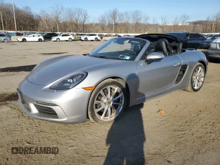 2017 Porsche 718 Boxster z VIN WP0CA2A80HS221639, wystawiony jako Copart lot #80668244 z przebiegiem 23 746 mil mil oraz Szkody całkowita. Historia ofert i sprzedaży dostępna na DreamBid. Obrazek 1.