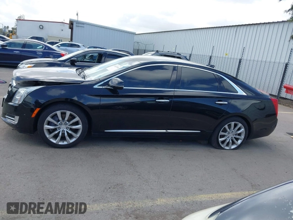 2017 Cadillac XTS Luxury with VIN 2G61M5S39H9108845, listed as a IAAI auction lot 41937510 with 168,241 mi miles and . Bid and sale history available at DreamBid. Image 14.