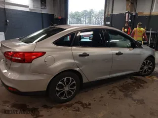 2016 Ford Focus S with VIN 1FADP3E22GL390039, listed as a IAAI auction lot 41958137 with 83,411 mi miles. Bid and sale history available at carsss.com. Image 6.