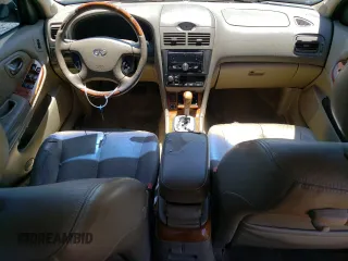 2003 Infiniti I35 Luxury with VIN JNKDA31A33T101980, listed as a Copart auction lot 58053074 with 208,993 mi miles and Salvage Title. Bid and sale history available at DreamBid. Image 8.