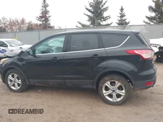 2013 Ford Escape SE with VIN 1FMCU0GX1DUD08065, listed as a IAAI auction lot 41721553 with 113,935 mi miles. Bid and sale history available at carsss.com. Image 15.
