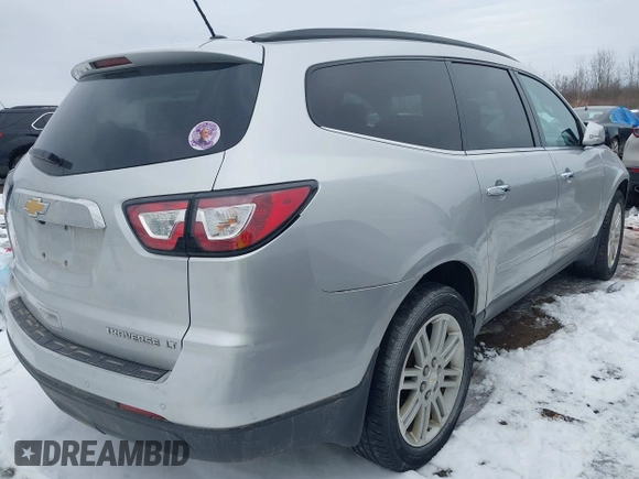 2015 Chevrolet Traverse LT with VIN 1GNKVGKD7FJ304682, listed as a IAAI auction lot 41697973 with 185,891 mi miles and . Bid and sale history available at DreamBid. Image 4.