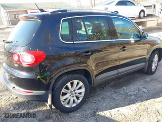 2009 Volkswagen Tiguan S with VIN WVGAV75N69W509504, listed as a IAAI auction lot 41881323 with 83,435 mi miles. Bid and sale history available at carsss.com. Image 4.