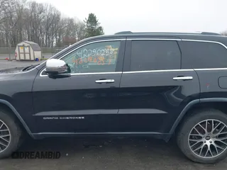 2014 Jeep Grand Cherokee Limited z VIN 1C4RJFBG0EC195654, wystawiony jako IAAI lot #42090257 z przebiegiem 195 615 mil mil oraz . Historia ofert i sprzedaży dostępna na DreamBid. Obrazek 14.