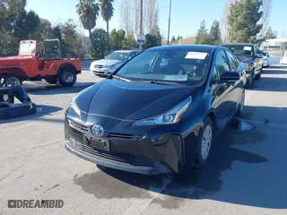 2021 Toyota Prius L Eco with VIN JTDKAMFU0M3133871, listed as a IAAI auction lot 41364847 with 66,102 mi miles. Bid and sale history available at carsss.com. Image 18.