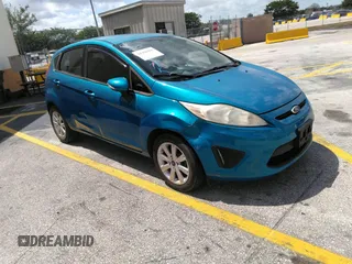 2013 Ford Fiesta SE with VIN 3FADP4EJ0DM202271, listed as a IAAI auction lot 41496985 with 174,624 mi miles. Bid and sale history available at carsss.com. Image 1.
