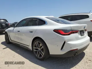 2024 BMW 4 Series 430i with VIN WBA63AV09RFR61736, listed as a Copart auction lot 52798015 with 45,705 mi miles and Salvage title. Bid and sale history available at DreamBid. Image 2.