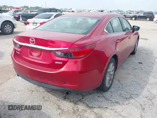 2016 Mazda 6 i Sport with VIN JM1GJ1U56G1409311, listed as a IAAI auction lot 41906256 with 126,548 mi miles and . Bid and sale history available at carsss.com. Image 4.