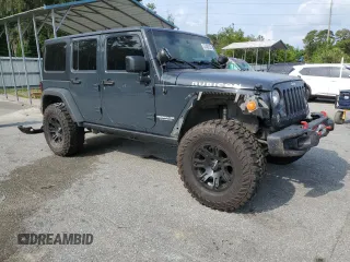 2017 Jeep Wrangler Unlimited Rubicon с VIN 1C4HJWFG8HL646923, выставлен на аукционе Copart как лот 57409125 с пробегом 79 835 миль миль и Списание • Salvage title. История ставок и продаж доступна на DreamBid. Изображение 4.